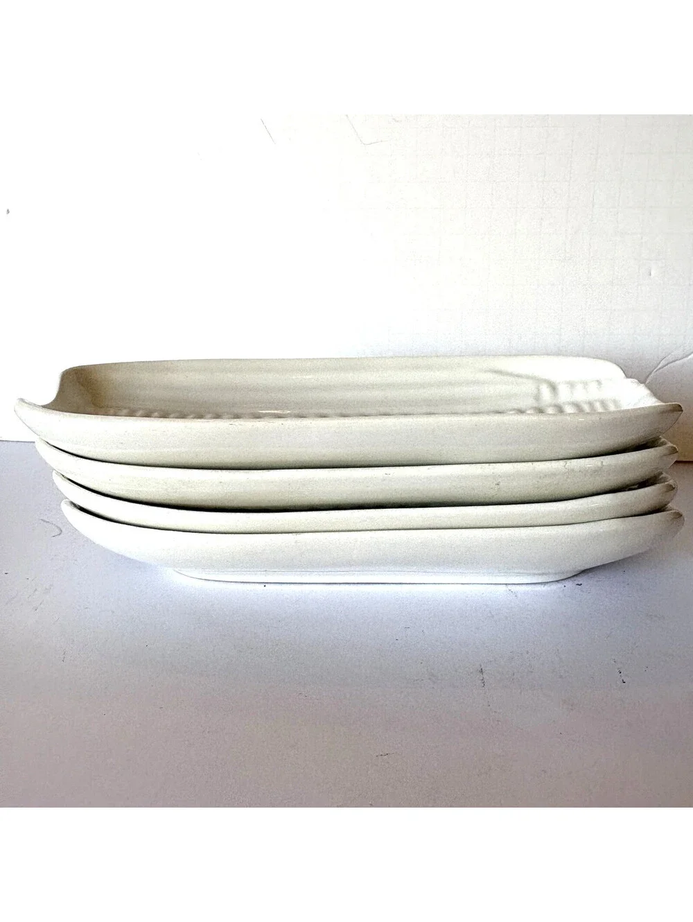 WHITE STONEWARE CORN ON THE COB HOLDERS SET OF FOUR